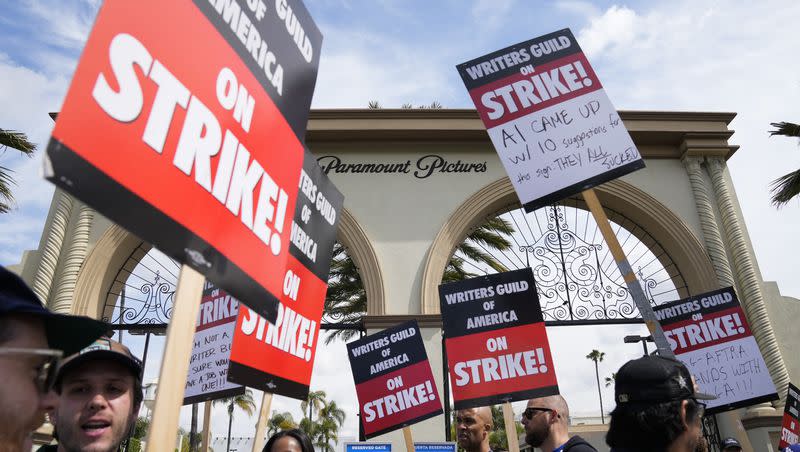 Members of the the Writers Guild of America picket outside Paramount Pictures on Wednesday, May 3, 2023, in Los Angeles. Television and movie writers declared late Monday, May 1, that they will launch an industrywide strike for the first time in 15 years, as Hollywood girded for a walkout with potentially widespread ramifications in a fight over fair pay in the streaming era.