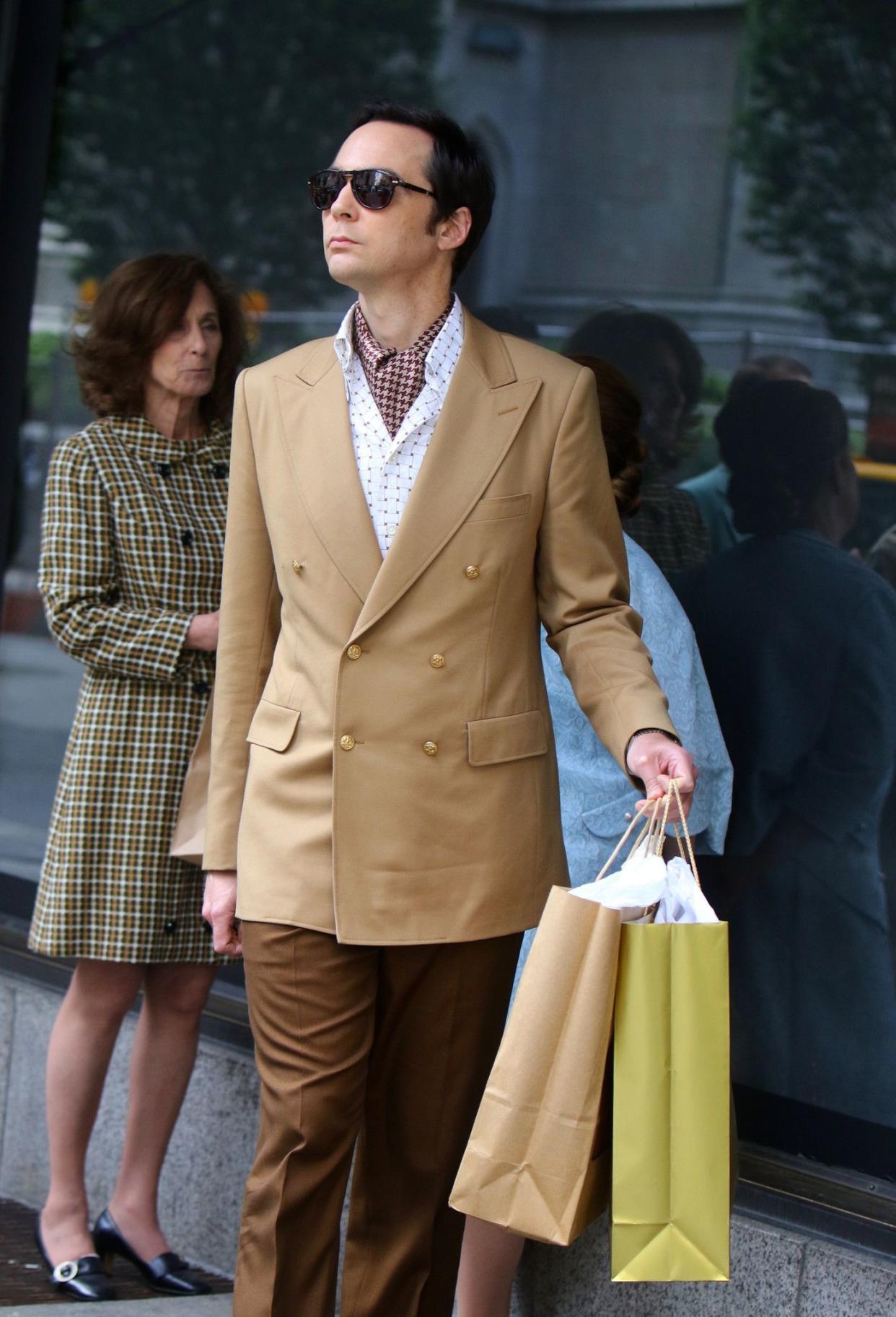 Jim Parsons makes shooting the upcoming “The Boys in the Band” movie look like a lesson in style. The actor was spotted shooting scenes for the 2020 flick at Saks Fifth Avenue in New York on Aug. 27, 2019 dressed to impress in a sharp, but casual suit and black shades.