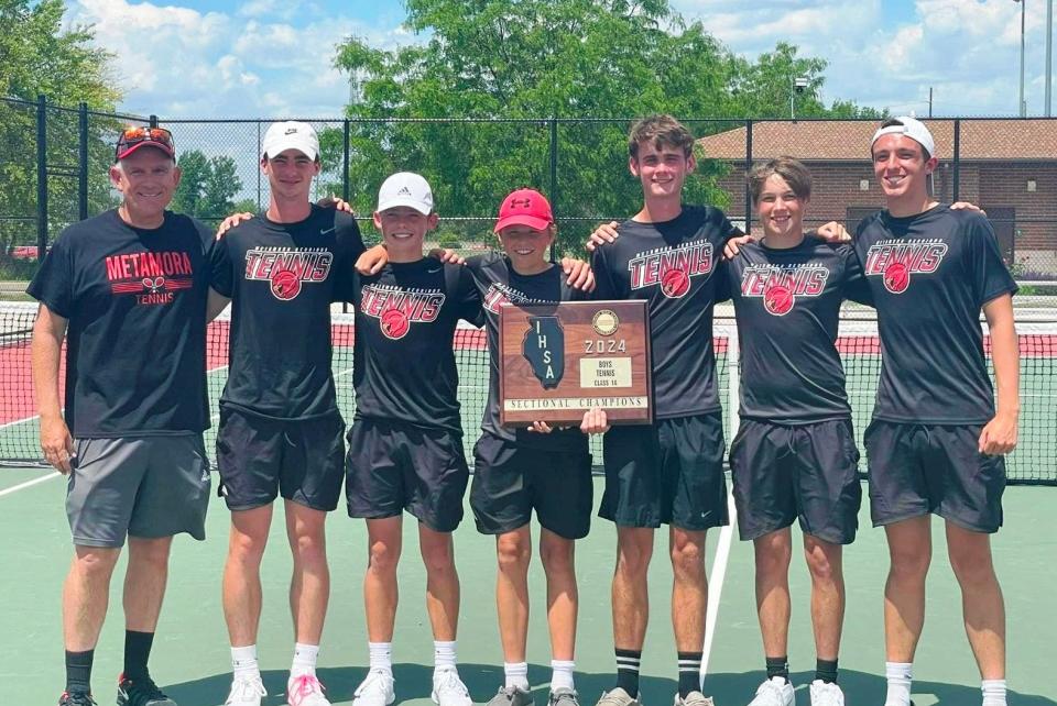 The Metamora High School boys tennis team celebrates its IHSA Class 1A LaSalle-Peru Sectional tennis championship on Saturday, May 18, 2024.