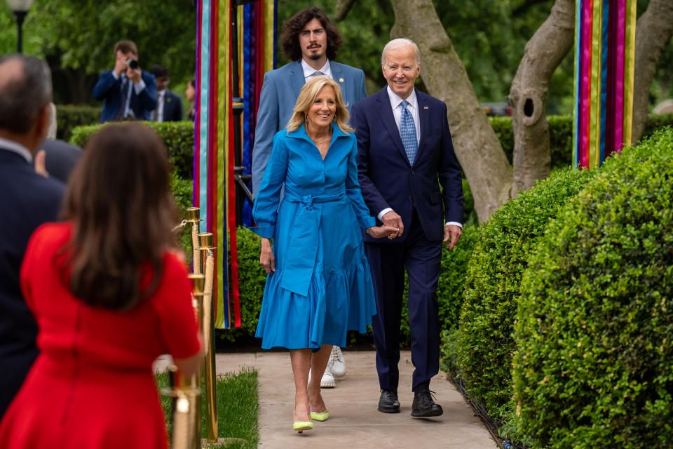 WASHINGTON, DC - MAY 6: U.S. President Joe Biden and first lady Jill Biden, trailed byJaime Jaquez of the NBA Miami Heat, arrive at a Cinco de Mayo reception in the Rose Garden of the White House on May 6, 2024 in Washington, DC. The annual Cinco de Mayo, which marks Mexico's victory over the French at the Battle of Puebla in 1862, has become a celebration of Mexcan-American culture in the U.S. (Photo by Andrew Harnik/Getty Images)