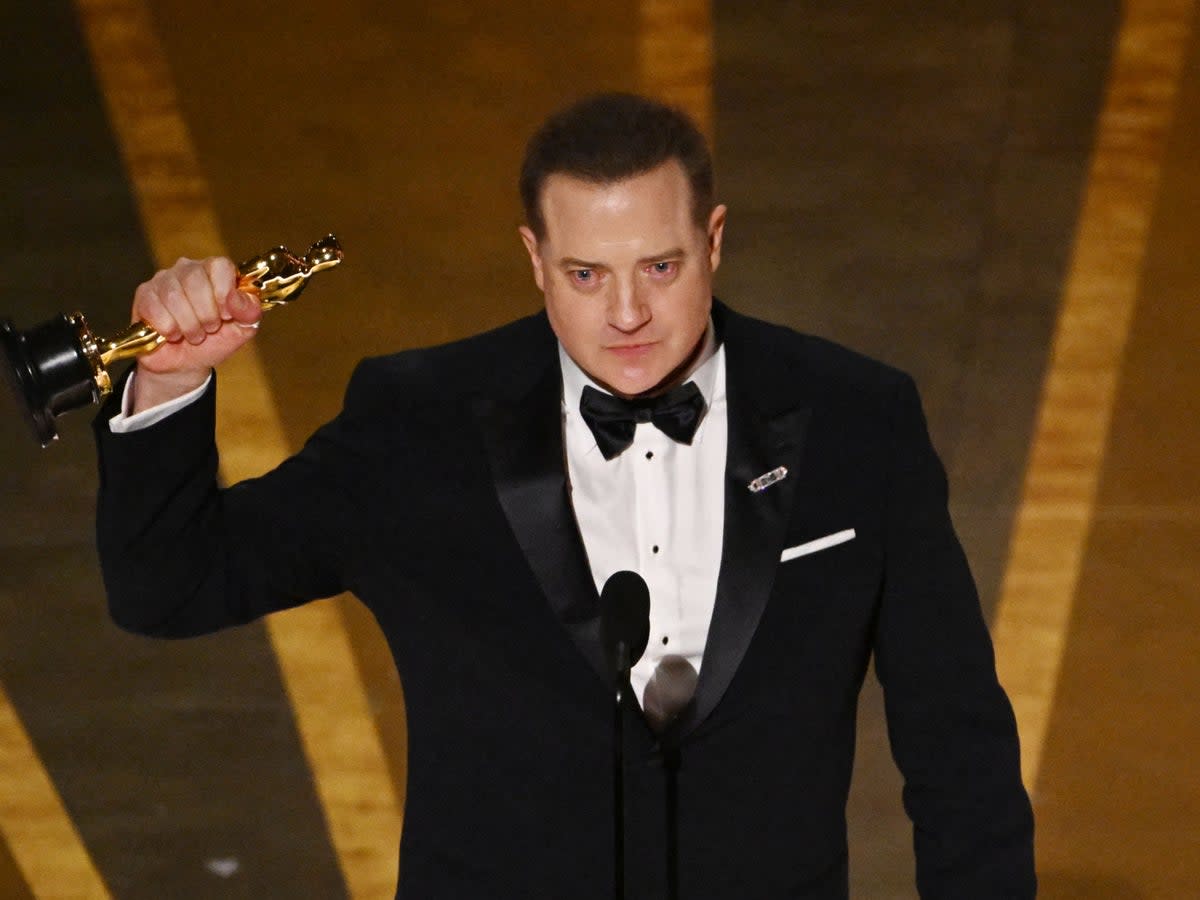 Brendan Fraser accepts the Oscar for Best Actor in a Leading Role for ‘The Whale' (AFP via Getty Images)