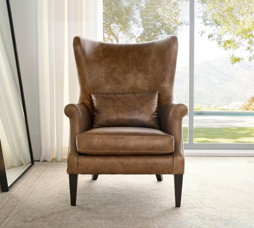 <p><a href="https://go.redirectingat.com?id=74968X1596630&url=https%3A%2F%2Fwww.potterybarn.com%2Fproducts%2Fchamplain-wingback-leather-armchair&sref=https%3A%2F%2Fwww.elledecor.com%2Fshopping%2Ffurniture%2Fg3224%2Freading-chairs%2F" rel="nofollow noopener" target="_blank" data-ylk="slk:Shop Now;elm:context_link;itc:0;sec:content-canvas" class="link ">Shop Now</a></p><p>Champlain Wingback Leather Armchair</p><p>potterybarn.com</p><p>$1999.00</p><span class="copyright">Pottery Barn</span>