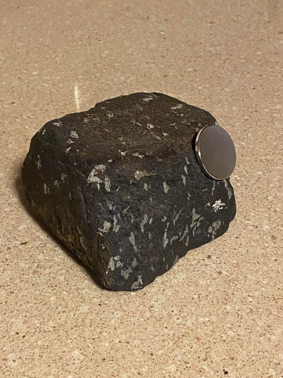 A sample of Cumberlandite, a rare magnetic mineral found in large concentrations only on 4 acres in Cumberland.