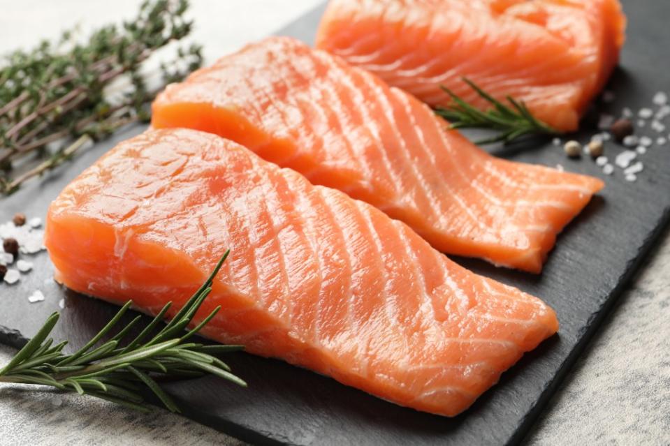 The American Heart Association recommends consuming two servings of fish a week, particularly fatty fish. Getty Images