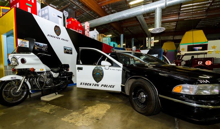 Children's Museum of Stockton police car and motorcycle exhibit