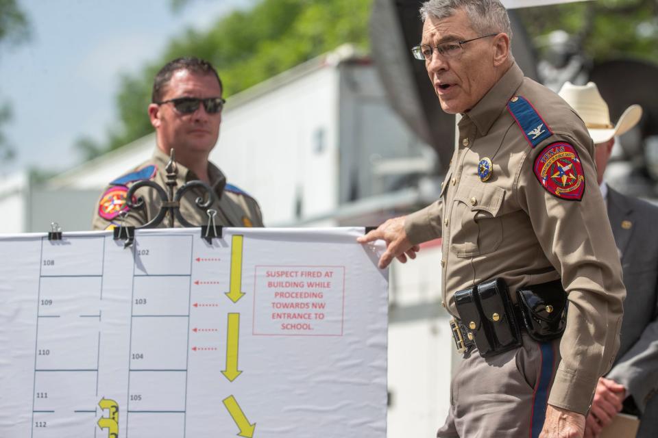Texas Department of Public Safety Director Steve McCraw, speaking at a news conference on Friday, points to map showing where a gunman entered Robb Elementary School on Tuesday before shooting and killing 19 students and two teachers.