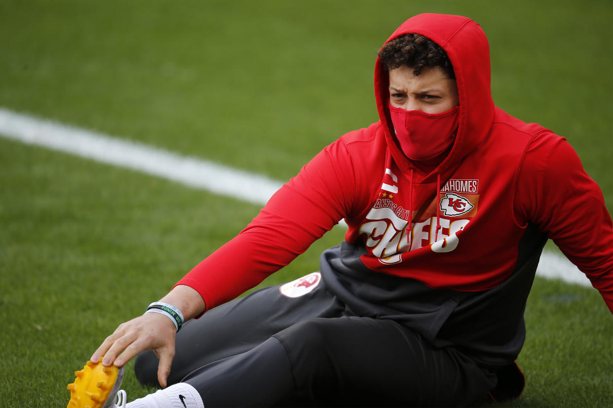 KANSAS CITY, MISSOURI - JANUARY 17: Quarterback Patrick Mahomes #15 of the Kansas City Chiefs warms up prior to the AFC Divisional Playoff game against the Cleveland Browns at Arrowhead Stadium on January 17, 2021 in Kansas City, Missouri. (Photo by David Eulitt/Getty Images)