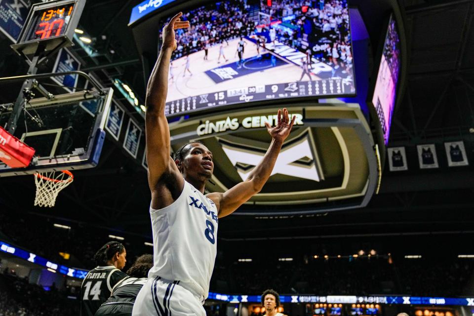 Xavier Musketeers guard Quincy Olivari (8) looks to the student section after scoring and getting fouled during the first half Wednesday, February 21, 2024 at the Cintas Center.