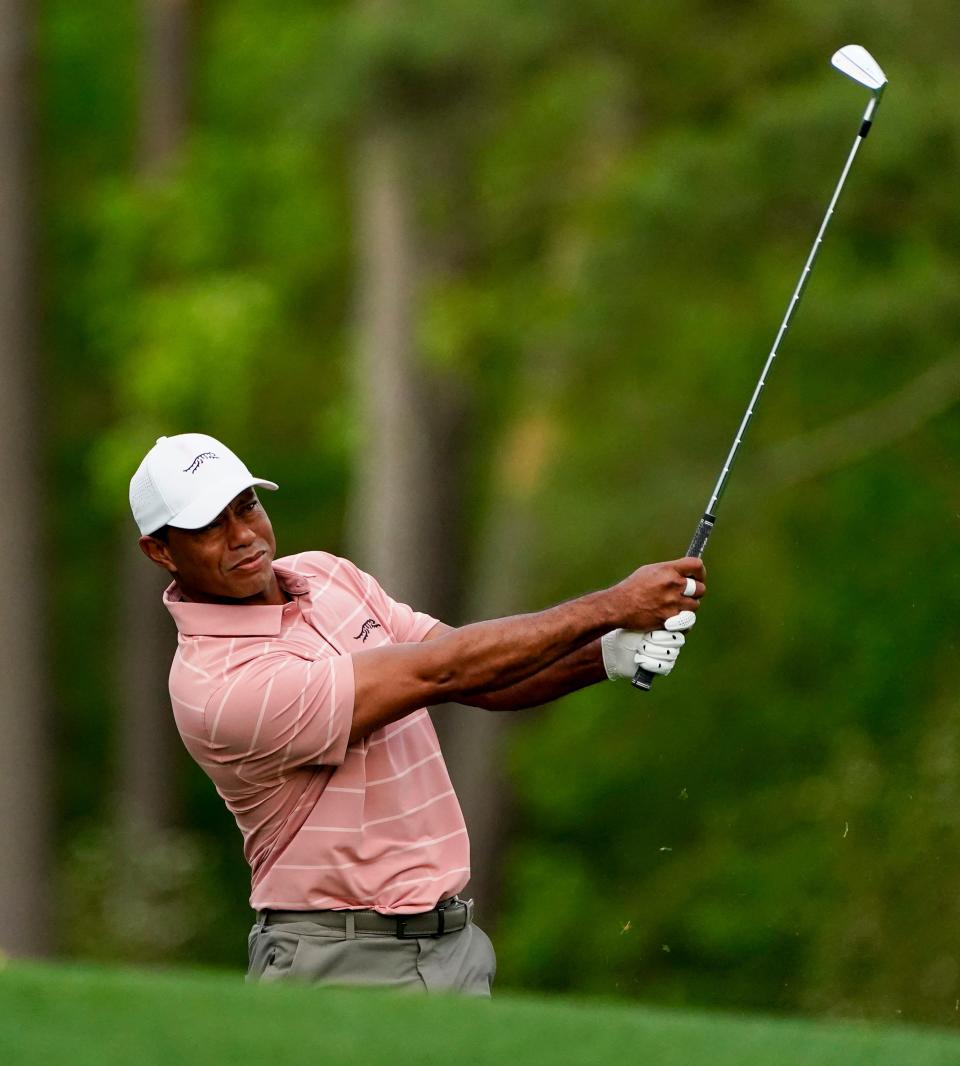 Apr 11, 2024; Augusta, Georgia, USA; Tiger Woods tees off on no. 12 during the first round of the Masters Tournament. Mandatory Credit: Katie Goodale-USA TODAY Network