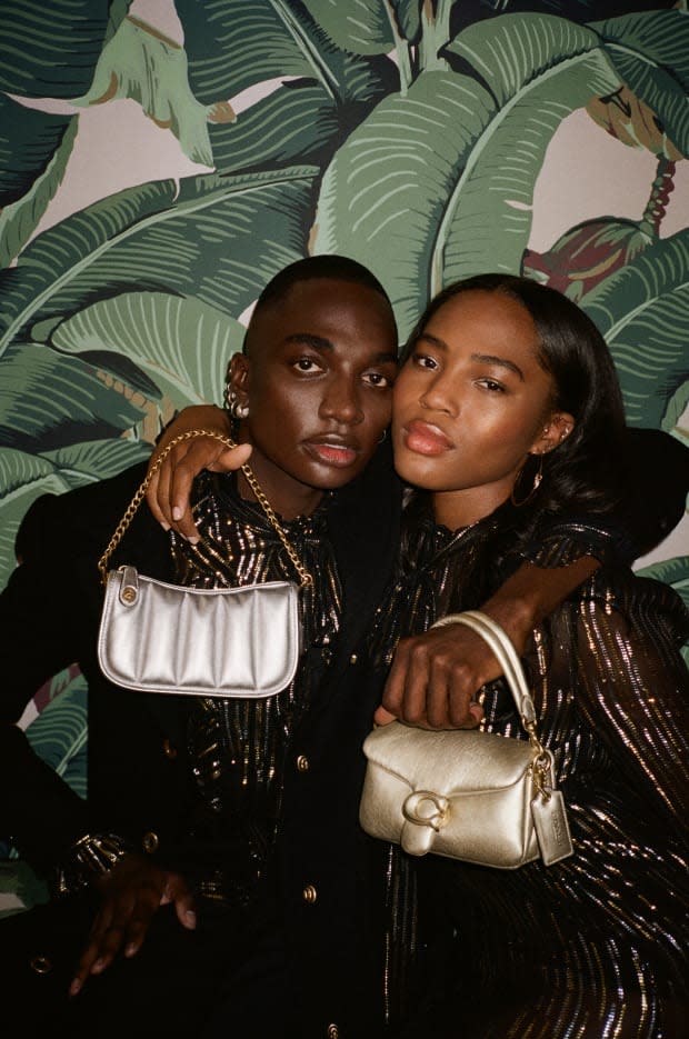<p>Rickey Thompson and Quen Blackwell in Coach's Holiday 2021 campaign. Photo: Pierre-Ange Carlotti/Courtesy of Coach</p>