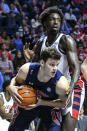 Auburn forward Walker Kessler (13) grabs a rebound against Mississippi center Nysier Brooks (3) during the second half of an NCAA college basketball game in Oxford, Miss., Saturday, Jan. 15, 2022. (AP Photo/Bruce Newman)