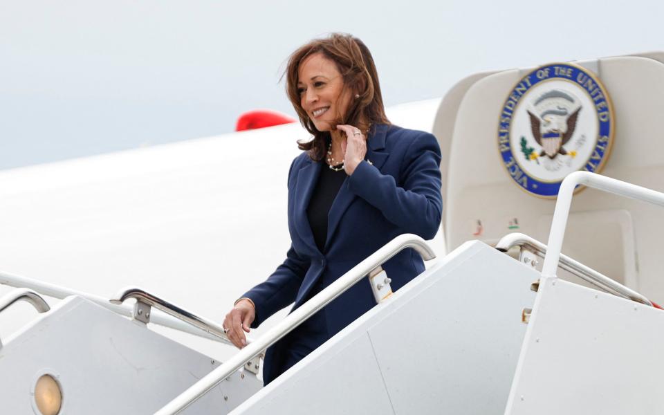 Kamala Harris descends from Air Force Two at Milwaukee Mitchell International Airport