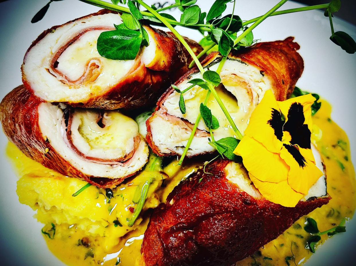 The new 18 Acres Hospitality focuses on private dinners and other events in clients' homes, typically 10 to 20 people at a time. This dish is pan-roasted chicken saltimbocca, wrapped in speck, served with potato puree and lemon-caper white wine sauce.