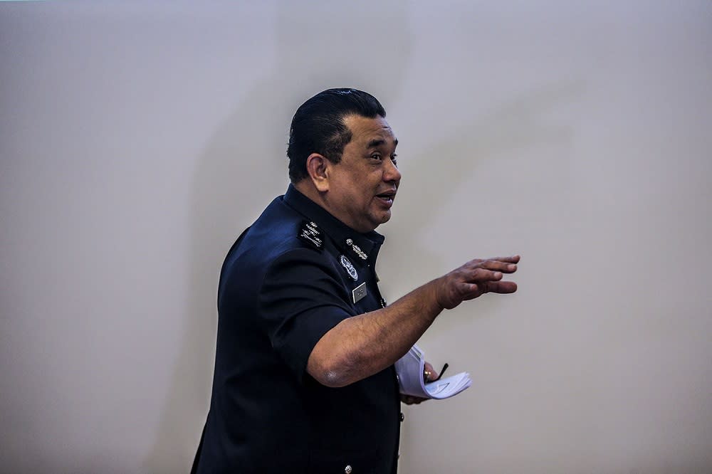 Bukit Aman Criminal Investigation Department (CID) director Datuk Huzir Mohamed leaves after a press conference at Bukit Aman in Kuala Lumpur December 1, 2020. — Picture by Hari Anggara