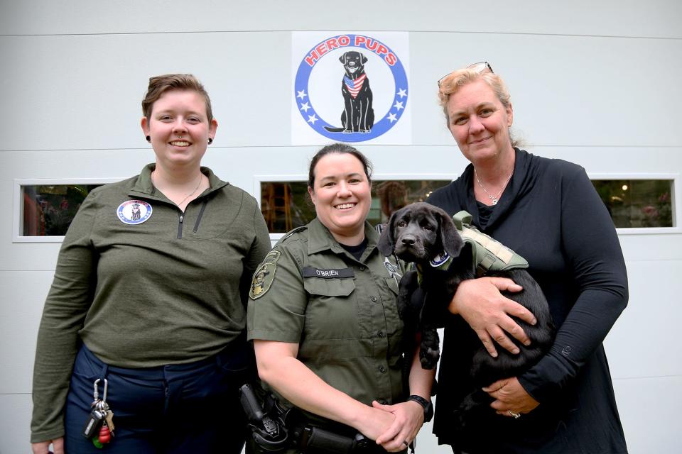 Hero Pups Head of Operations Selena Barker, left, Deputy Katie O’Brien and Hero Pups Founder Laura Barker are continuing to train Cara, the Strafford County Sheriff’s Department's first comfort dog, as seen Thursday, June 2, 2022 in Exeter.