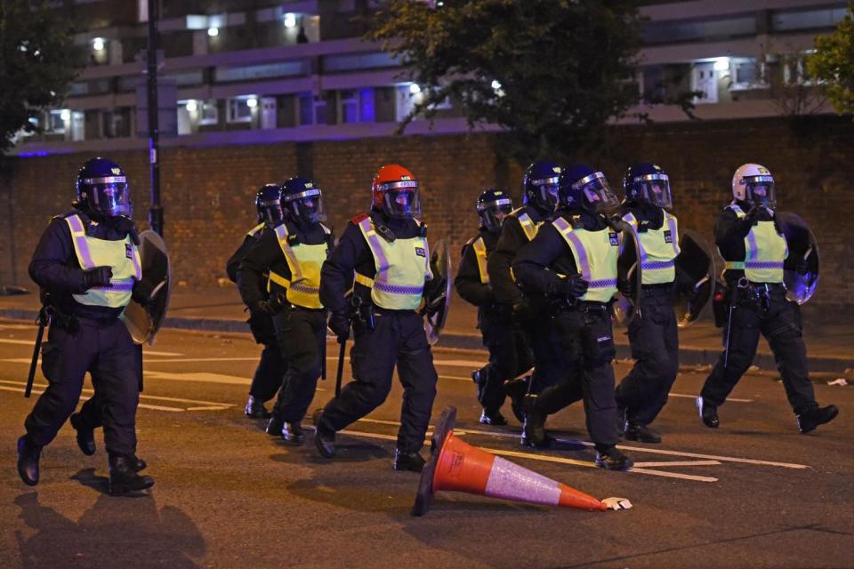 Riot police and horses were drafted in. (PA)