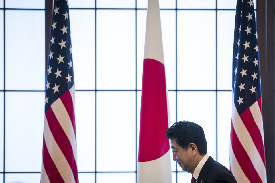 Japan's Prime Minister Shinzo Abe attends the 60th anniversary commemorative reception of the signing of the Japan-US security treaty at the Iikura Guesthouse in Tokyo, Sunday, July 19, 2020. (Behrouz Mehri/Pool Photo via AP)