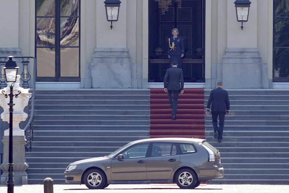 Dutch Prime Minister Mark Rutte walks up the red carpet of Palace Huis ten Bosch in The Hague, Netherlands, Saturday, July 8, 2023 to inform King Willem-Alexander that his coalition government has resigned. Rutte announced the collapse of the government Friday night. (AP Photo/Michael Corder)