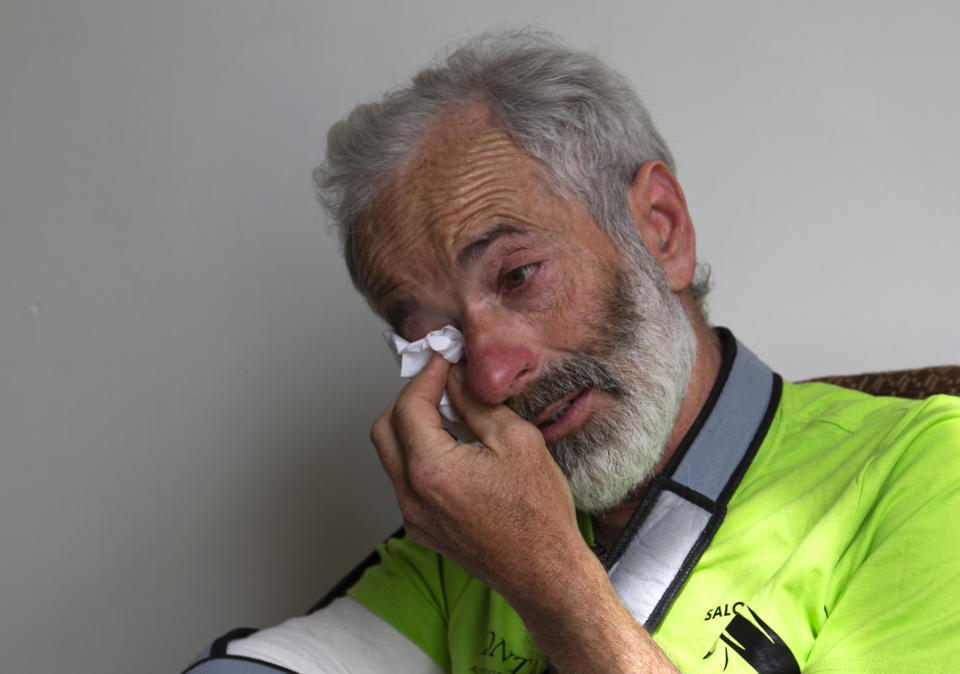 The team leader, Tarcisio Bellò, 57, breaks in tears while talking about his Pakistani colleague who lost his life during heavy avalanche, in Islamabad, Pakistan, Thursday, June 20, 2019. The renowned Italian mountaineer, who narrowly survived along-with six other members of an expedition on a mountain, recalled how helplessly he saw one of his Pakistani colleagues being swept away by an avalanche that struck them at an altitude of around 5,300 meters (17,390 feet) earlier this week. (AP Photo/B.K. Bangash)