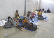 Refugees seek shelter at a centre in Afungi, Mozambique after fleeing attacks in Palma in Northern Mozambique Friday April 2, 2021. Southern African Development Community leaders will meet in Maputo, Mozambique for two days starting Thursday, April 8, 2021, to deliberate on measures to address terrorism in the northern area of the country. (AP Photo)