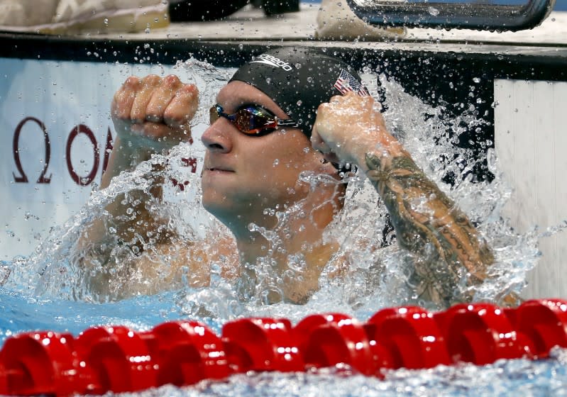 TOKYO, - AUGUST 01: U.S. swimmer Caeleb Dressel reacts after winning.