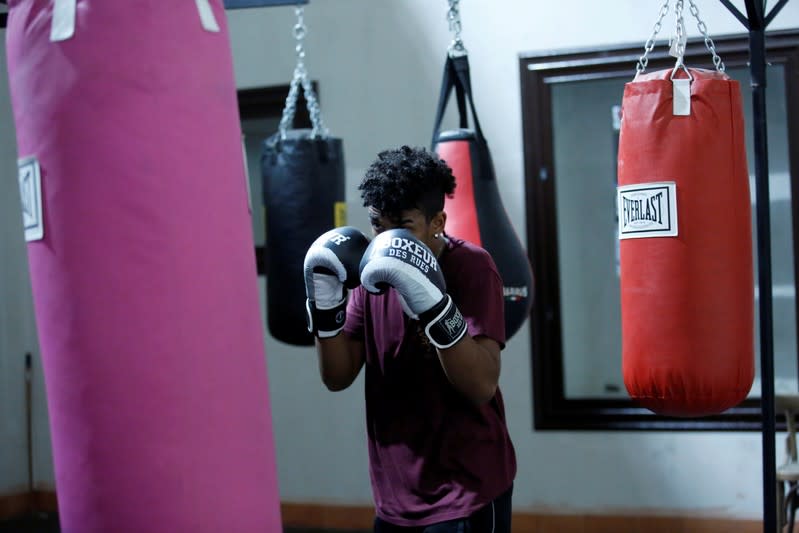 Nico Rodrigues, 21, trains during a boxing class at the Santa Maria della Sanita Basilica in the Rione Sanita neighbourhood in Naples