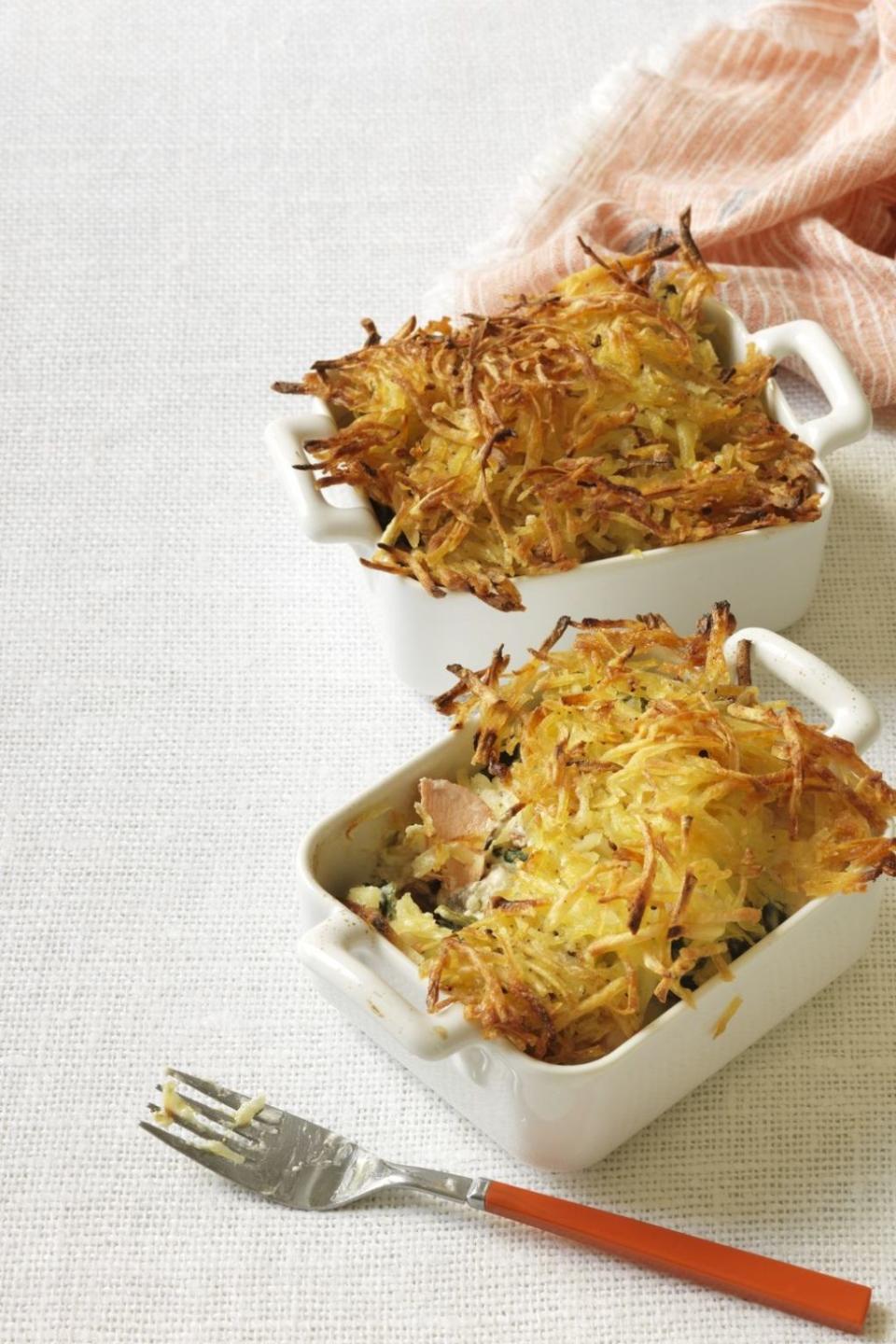 <p>Succulent fish and seafood become a decadent dinner when mixed into a creamy sauce topped with a crispy, shredded potato crust.</p><p><a rel="nofollow noopener" href="http://www.womansday.com/food-recipes/food-drinks/recipes/a12460/seafood-bake-crispy-hash-brown-topping-recipe-wdy0314/" target="_blank" data-ylk="slk:Get the recipe." class="link "><strong>Get the recipe.</strong></a> </p>