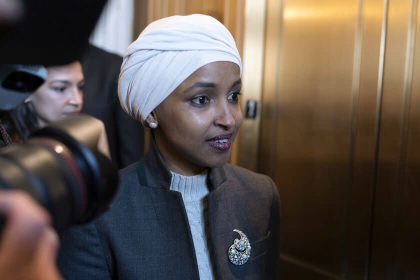 Rep. Ilhan Omar, D-Minn., leaves the House chamber at the Capitol in Washington, Thursday, Feb. 2, 2023. House Republicans have voted to oust Omar from the House Foreign Affairs Committee. The vote in a raucous session on Thursday to remove the Somali-born Muslim lawmaker came after her past comments critical of Israel. (AP Photo/Jose Luis Magana)