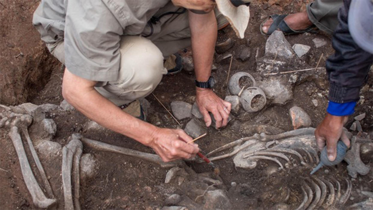  Archaeologists excavate the remain of a priest or shaman who lived about 3,000 years ago in Peru. 