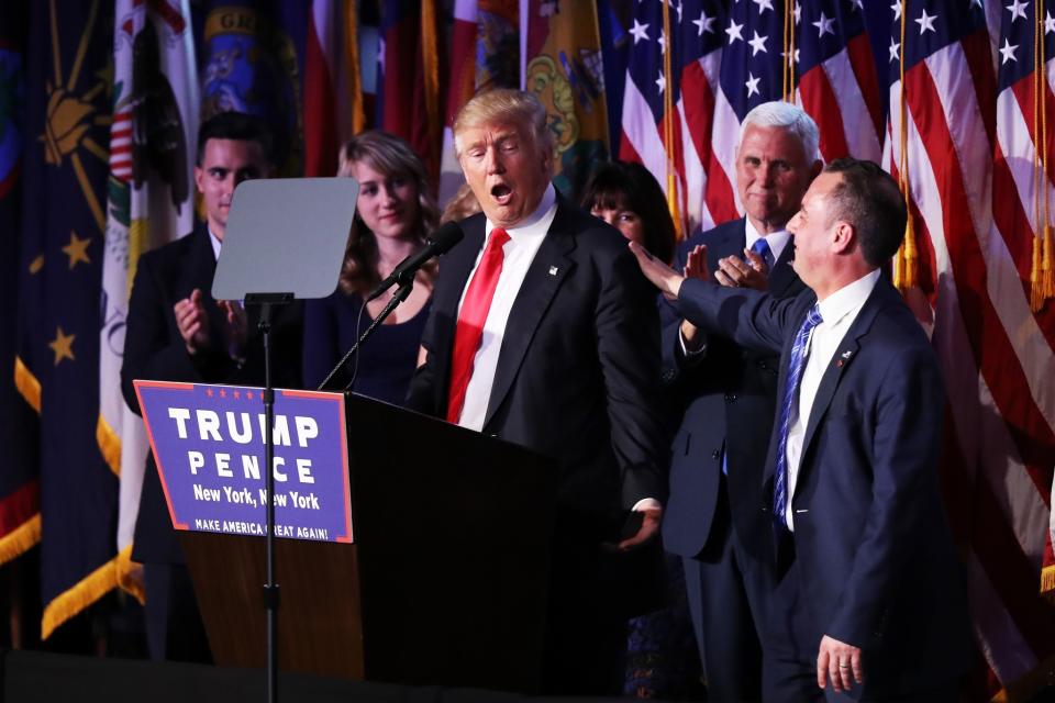 Republican president-elect Donald Trump delivers his acceptance speech as Vice president-elect Mike Pence and Reince Priebus, chairman of the Republican National Committee, look on during his election night event at the New York Hilton Midtown in the early morning hours of November 9, 2016 in New York City. (Photo: Joe Raedle/Getty Images)