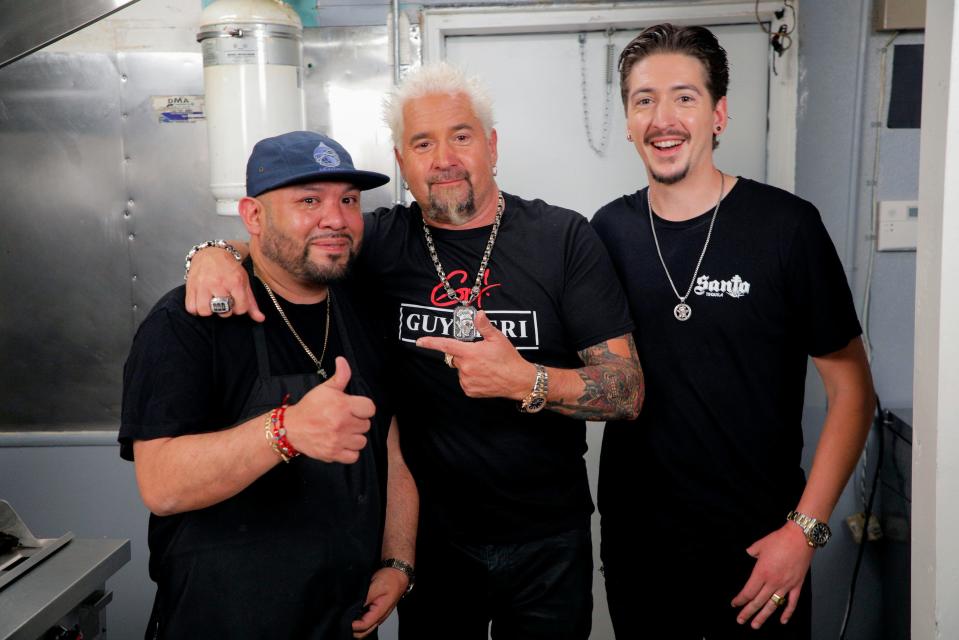 Eric Lucero (left), owner of Heights 167 in Point Pleasant Beach, with Guy Fieri and his son Hunter Fieri during filming for an episode of "Diners, Drive-Ins and Dives."