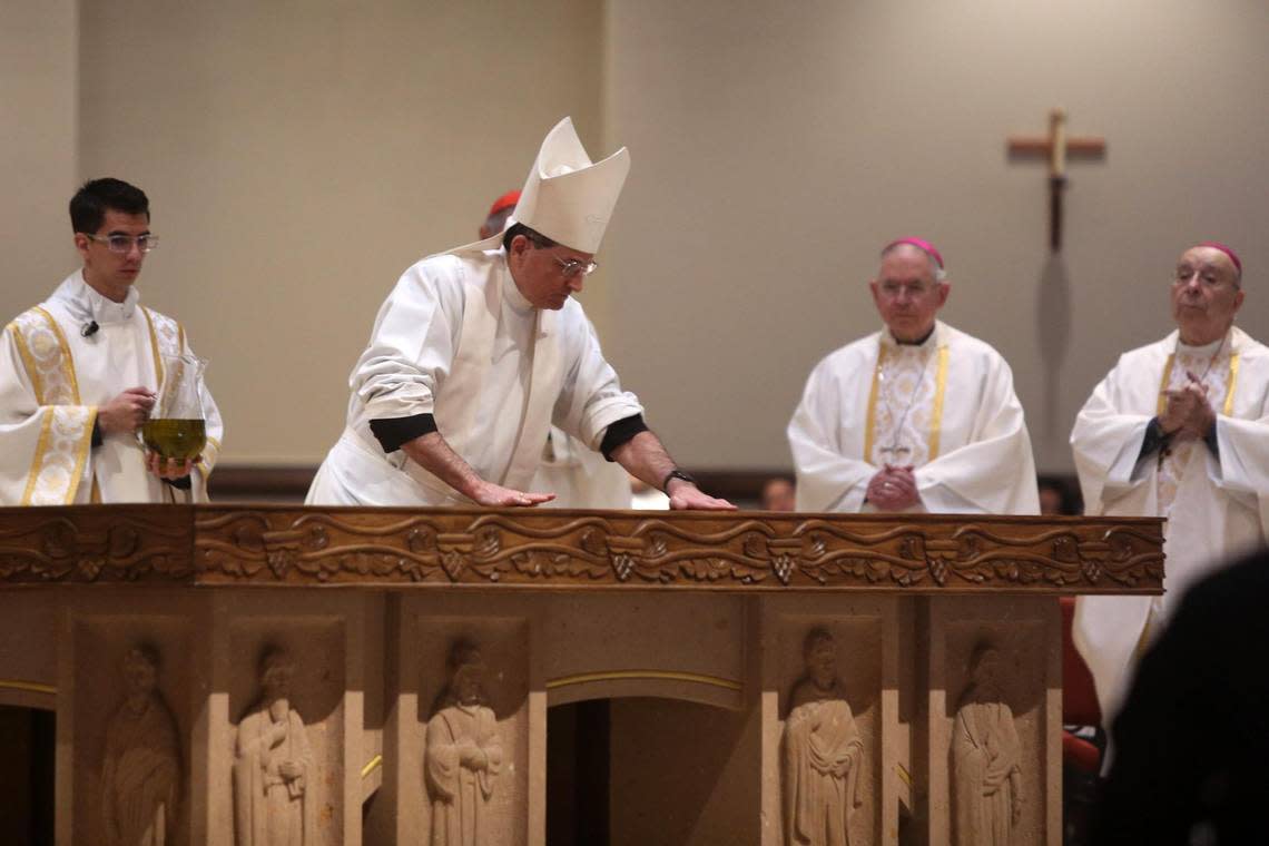Fresno Diocese Bishop Joseph V. Brennan, during the anointing of the altar during the mass dedication of St. Charles Borromeo in Visalia on Feb. 2, 2023. It is now North America’s largest Catholic parish church.
