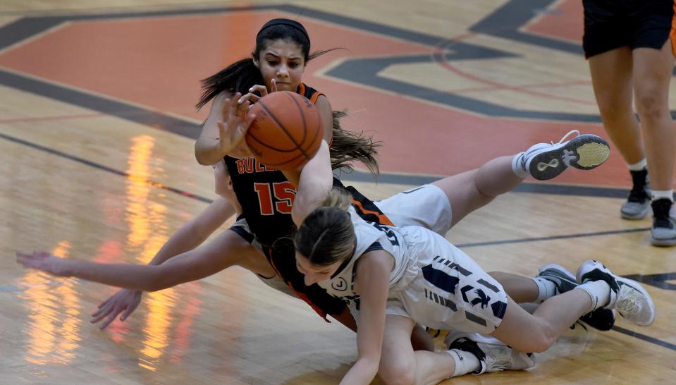 Jaeli Jones of Summerfield tangles up with Brooke Weber in the Division 4 Regional final at Summerfield Thursday, March 9, 2023.