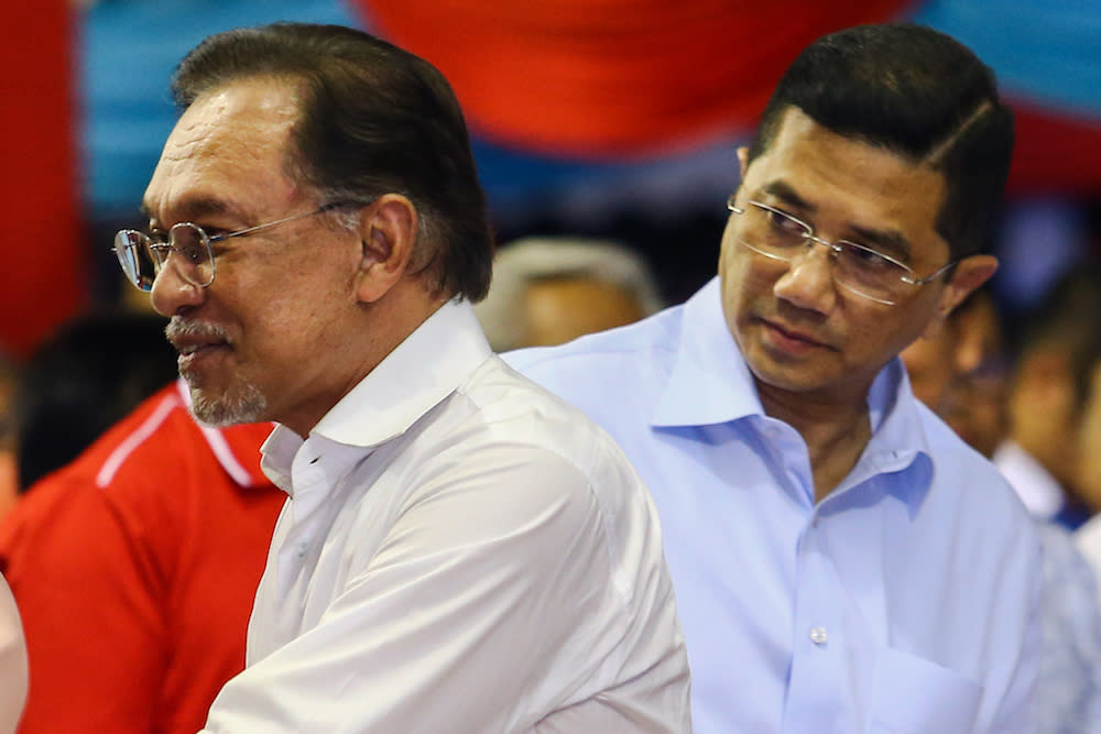 Datuk Seri Anwar Ibrahim and Datuk Seri Azmin Ali attend PKR’s 20th anniversary celebrations at Dataran Rantau, Negri Sembilan April 4, 2019. — Picture by Hari Anggara