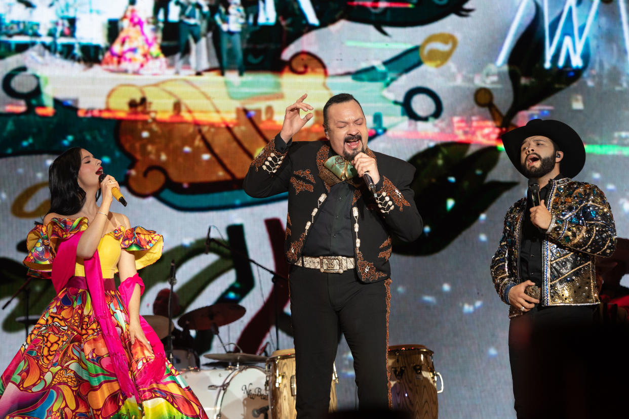MEXICO CITY, MEXICO - DECEMBER 07: Angela Aguilar, her father Pepe Aguilar, and her son Leonardo Aguilar performing during Radiopolis company celebration 'Santa Fiesta 2022, at Foro Sol on December 7, 2022 in Mexico City, Mexico. (Photo by Medios y Media/Getty Images)