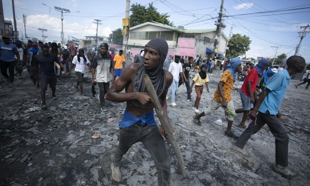 <span>Photograph: Odelyn Joseph/AP</span>