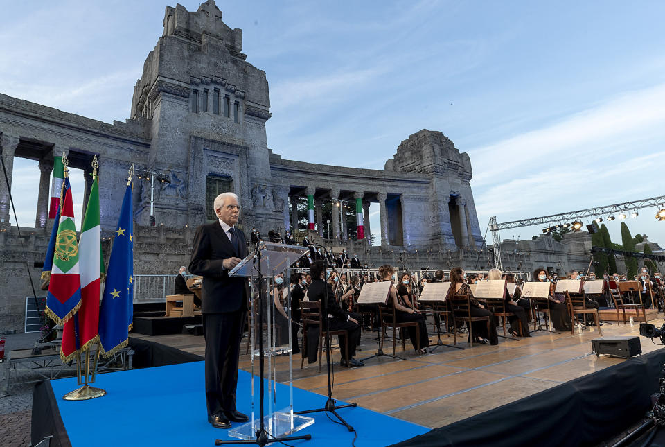 Italian President Sergio Mattarella speaks in front of Bergamo's cemetery, Sunday, June 28, 2020. Italy bid farewell to its coronavirus dead on Sunday with a haunting Requiem concert performed at the entrance to the cemetery of Bergamo, the hardest-hit province in the onetime epicenter of the outbreak in Europe. President Sergio Mattarella was the guest of honor, and said his presence made clear that all of Italy was bowing down to honor Bergamo’s dead, “the thousands of men and women killed by a sickness that is still greatly unknown and continues to threaten the world.” (Italian Presidency via AP)