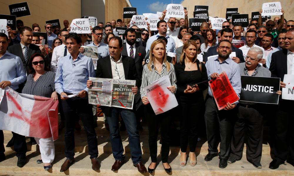 Journalists in Valletta, Malta, protest against the murder of investigative journalist Daphne Caruana Galizia