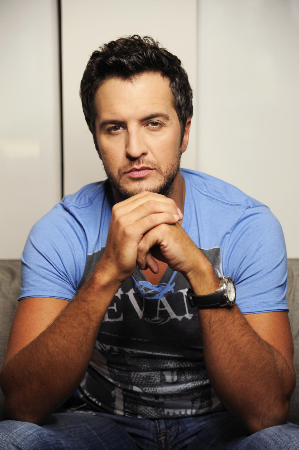In this Tuesday, July 16, 2013 photo, Luke Bryan poses for a portrait at Audio Productions in Nashville, Tenn. Bryan has taken an unusual approach to the business side of his career since winning the Academy of Country Music's entertainer of the year in April: He's turning down almost everything. (Photo by Donn Jones/Invision/AP)