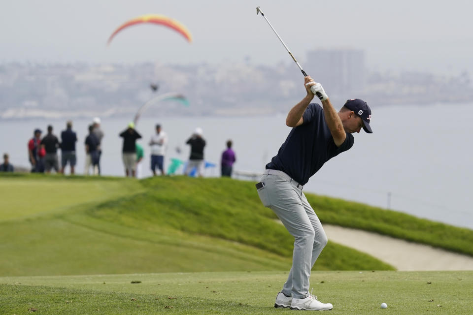 Russell Henley plays his shot on the second hole during the second round of the U.S. Open Golf Championship, Friday, June 18, 2021, at Torrey Pines Golf Course in San Diego. (AP Photo/Gregory Bull)