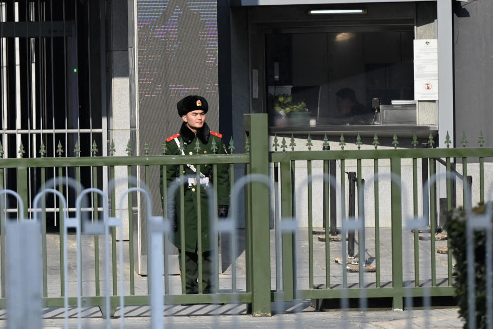 A Chinese paramilitary police officer stands guard outside the Australian embassy in Beijing, Feb. 5, 2024. / Credit: PEDRO PARDO/AFP/Getty