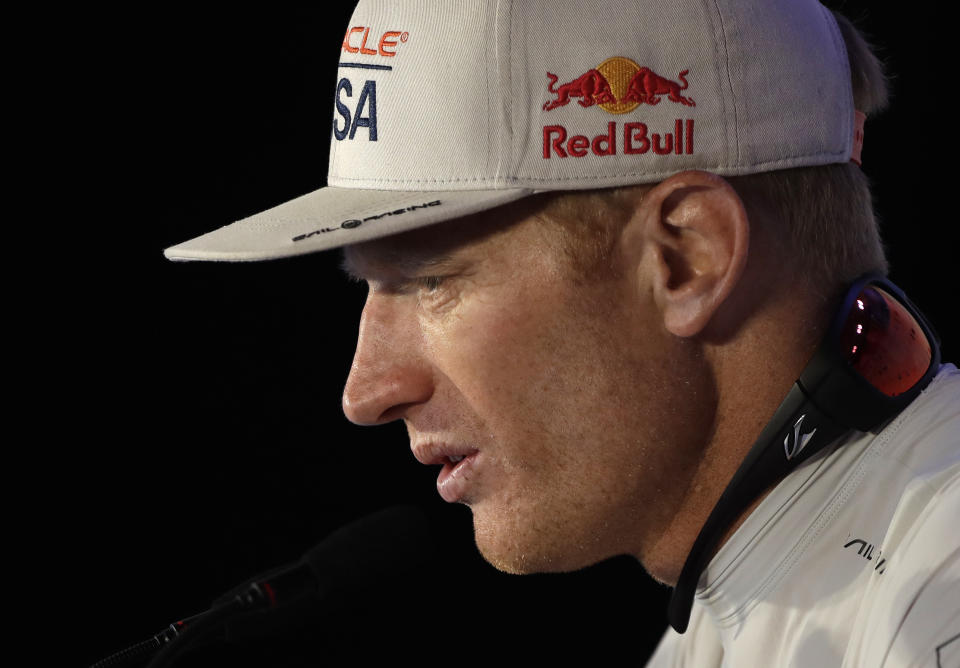 FILE - In this Monday, June 26, 2017, file photo, Oracle Team USA skipper Jimmy Spithill answers questions during a news conference following his team's America's Cup loss to Emirates Team New Zealand in sailing competition in Hamilton, Bermuda. Spithill has signed on as CEO and helmsman of the United States team in SailGP, giving the global league another former America's Cup champion in its stable of stars. (AP Photo/Gregory Bull, File )