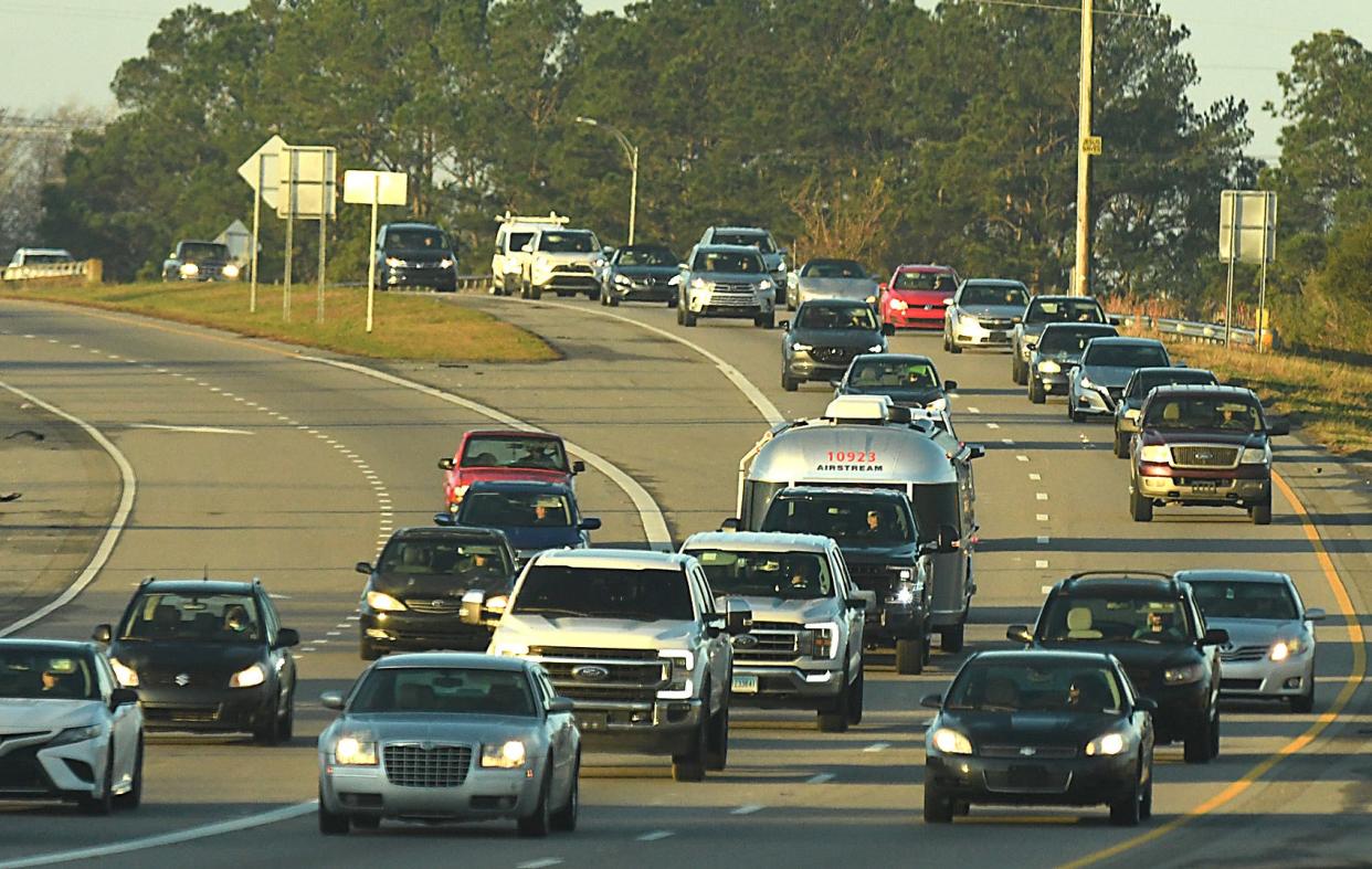 Traffic travels into Wilmington along U.S. 17 from Brunswick County on Wednesday, Jan. 5, 2022. The county's record growth is fueling the region's economy, experts say.