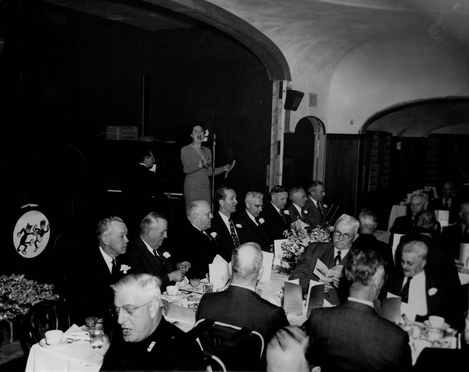 A singer entertains the crowd at Barnard Restaurant and Party House in Greece in this circa 1940s or 1950s photo.