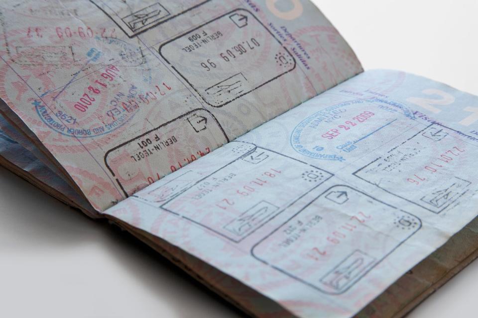 A United States passport with various country stamps