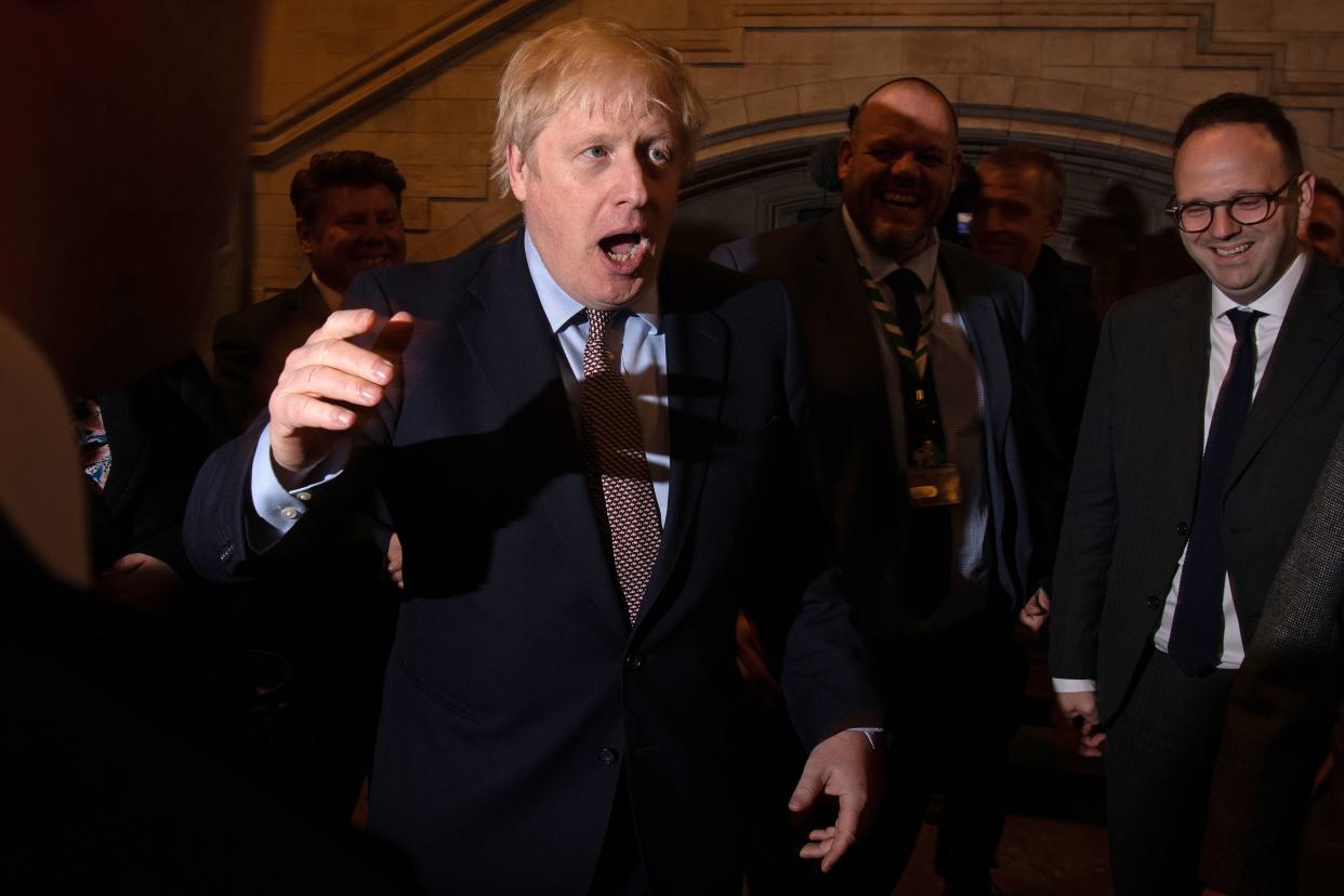 Britain's Prime Minister Boris Johnson greets newly-elected Conservative MPs in Westminster Hall in the Palace of Westminster, central London on December 16, 2019. Photo: LEON NEAL/POOL/AFP via Getty Images