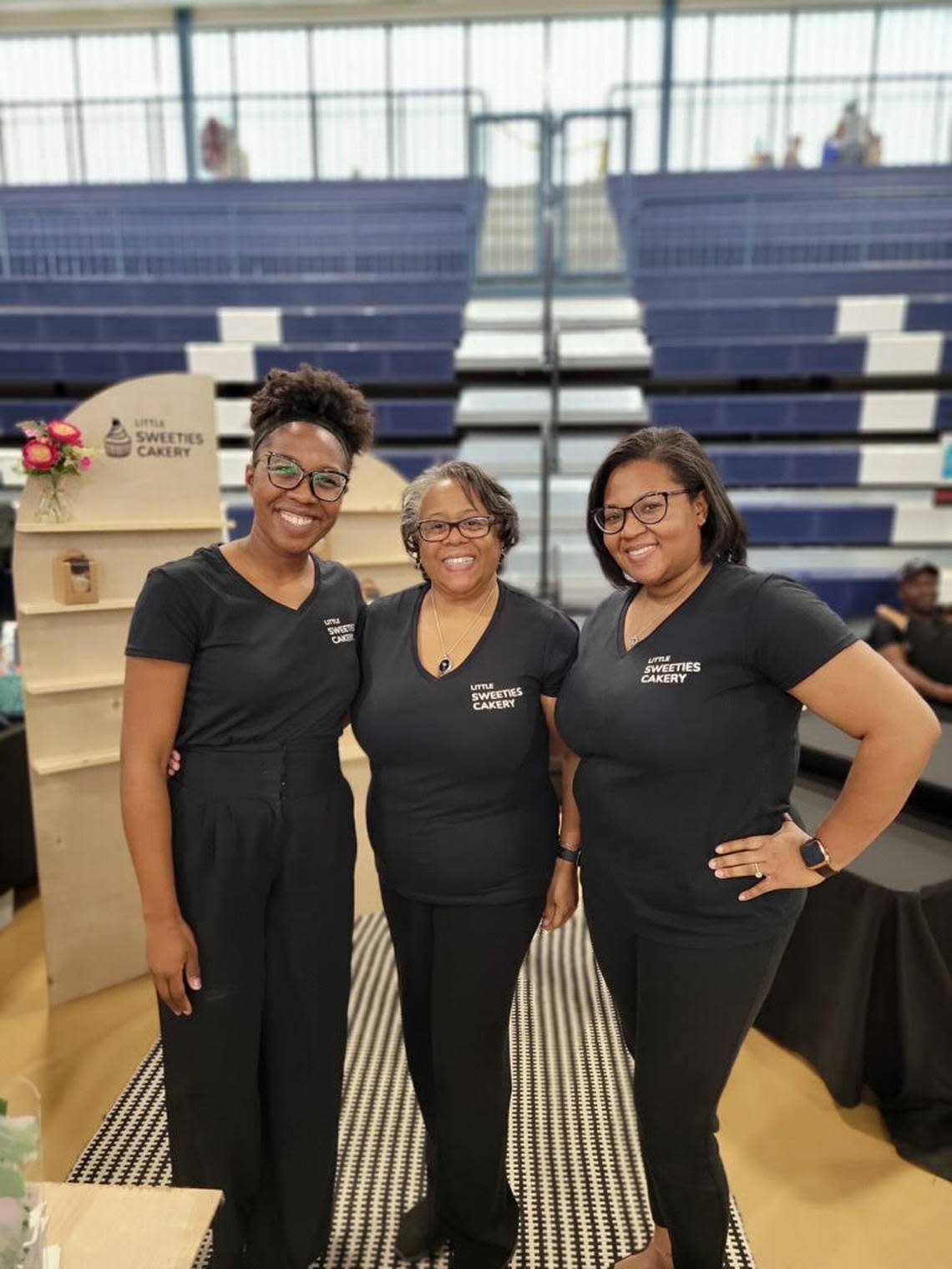 From left to right, Jay White, Pamela Johnson and Pamela Spellman of Little Sweeties Cakey in Warner Robins, at The Eagle Fest community festival at Northside High School in March.