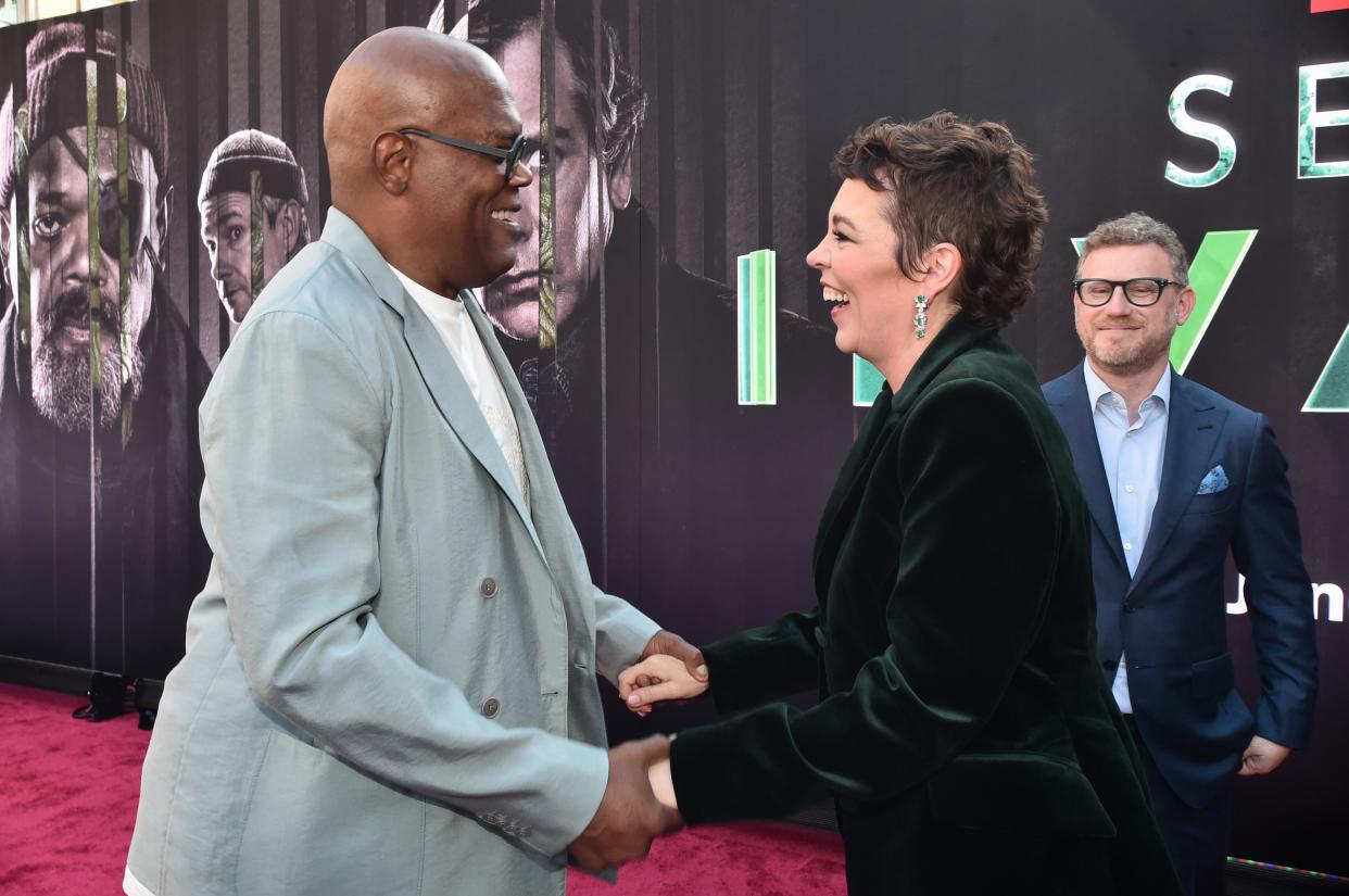 Samuel L. Jackson and Olivia Colman greet each other at the Hollywood premiere of "Secret Invasion."