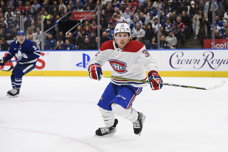Montreal Canadiens forward Rem Pitlick (32) skates toward the puck during first-period NHL hockey game action against the Toronto Maple Leafs in Toronto, Saturday, Feb. 18, 2023. (Christopher Katsarov/The Canadian Press via AP)