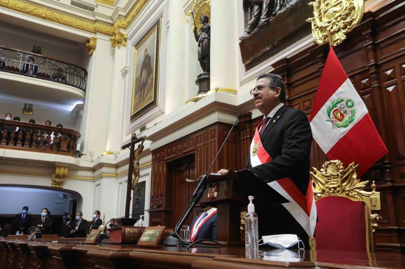 Peru's interim President Manuel Merino addresses lawmakers at Congress after he was sworn in following the removal of President Martin Vizcarra, in Lima